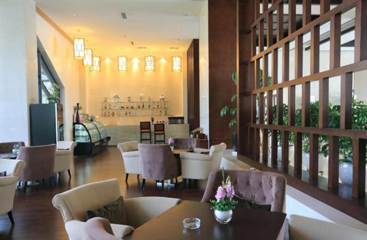 Готель Ramada Suzhou Luzhi Екстер'єр фото